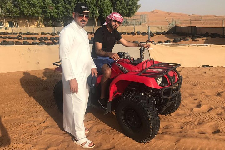 Experience the excitement of quad biking through Dubai's stunning desert dunes paired with an enriching city tour showcasing iconic landmarks like the Burj Khalifa and Jumeirah Mosque.